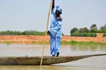 woman driving boat